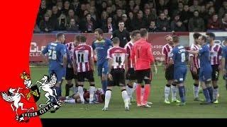 Matt Grimes tackled by AFC Wimbledon's Sammy Moore | Exeter City Football Club