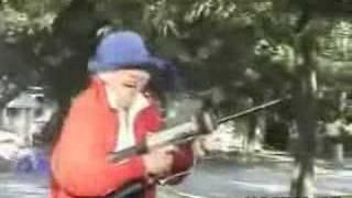 Crazy Grandma Tries to Shoot an Automatic Paintball Gun