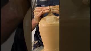 The process of making a clay piggy bank and designing it using the Engob method.#shorts   #pottery