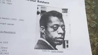 Kevin Grace visits the grave of James Baldwin in New York