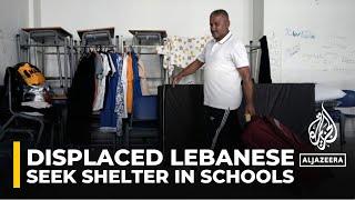 As Israel attacks, displaced Lebanese seek shelter in schools