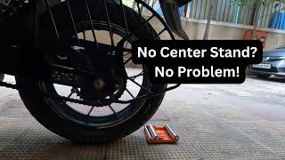 How to Clean and Lubricate a Motorcycle Chain with a Groller? | No Center Stand | Suzuki V-Strom SX