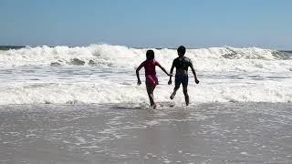 Enjoying the Big Waves and Swimming at Seaside Heights Beach, New Jersey