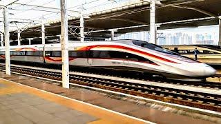 350kph through the station at FULL SPEED. Futuristic and incredible Chinese High Speed Train.