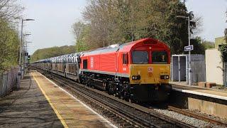 Freshly repainted DB Cargo 66002 powers through Kemsing with the Toyota car train - 12/4/24