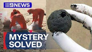 Mystery of black balls on Sydney beach solved | 9 News Australia