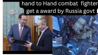 The famous hand to hand combat fighter Andrey Grigoriev awarded by Russian govt with a knife.