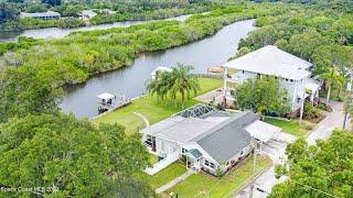 1304 Lichty St., Palm Bay, FL 32905 Stunning Florida pool home on navigable river w/ocean access