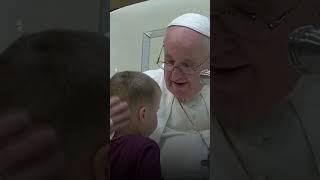 Little boy runs up stairs to Pope Francis's side | USA TODAY #Shorts