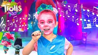 Levi and Ivy Help Trolls Princess Poppy with Music!