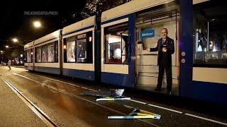 Dutch police disperse people from streets after Amsterdam tram set on fire amid high tensions