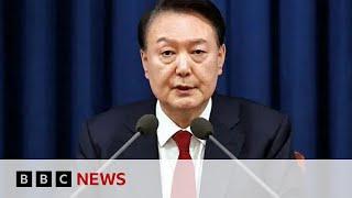 South Korea MPs vote to impeach president after mass protests over martial law | BBC News