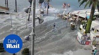 The streets of Alcudia in Mallorca are flooded by mini-tsunami