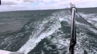 Catamaran sailing at 18knots very close to flying a hull