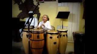 O'Nkosi Rhythm Wizards or THE GEMMS at the time.. 11 years old Michelle playing six drums