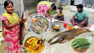5 KG of large sized MAGUR FISH cut and cooked in a KADAI BHAPA in the Santali Native style