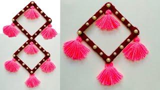 DIY NEW WALL HANGING TORAN IDEA/BEST OUT OF WASTE/ICE CREAM STICKS AND WOOL/NEW DESIGN