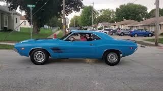 Cars leaving the 2023 Gretna Days Car Show in Gretna, Nebraska