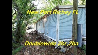 #NEW PORT RICHEY FLORIDA-Doublewide mobile home on own land 2br, 2ba, no Fees-no Park $65k will sell