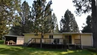 Clean Spacious Manufactured Home on .43 Acre with Canal Frontage