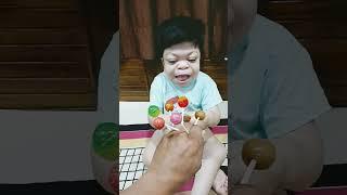 cute baby loves lollipop..