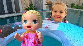 Diana and her super fun day with Baby Doll