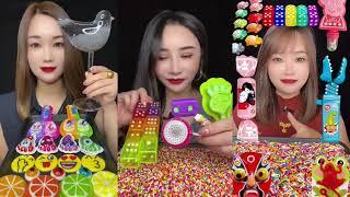 MUKBANG ASMR  3 GIRLS COMPETE TO SEE WHO IS THE BEST AT EATING CANDY.