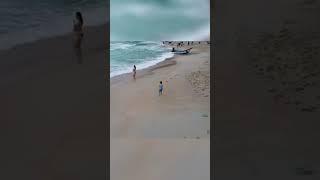 Boy running on the beach! Guess what country? answer at the end!