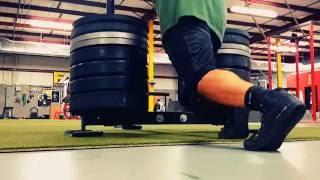 655 lb sled push on turf.