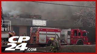 Crews are on scene of a massive industrial fire in Mississauga