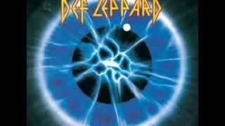 Def Leppard-Stand Up Kick Love Into Motion