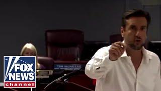 Clay Travis crashes school board meeting to encourage parents fighting CRT