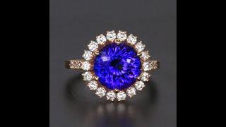 Custom Designed Tanzanite and Diamond Halo Ring