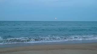 Moon rise at sunset