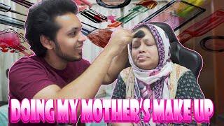 Doing make up on my mother's face :D