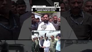 Maharashtra CM Eknath Shinde greets crowd from inside IAF C-295 at Navi Mumbai Airport