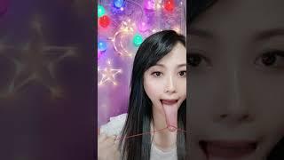 Chinese woman loves to show off her freakishly long tongue