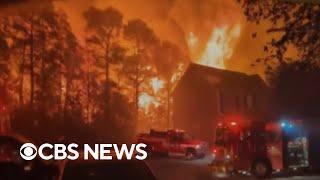 Massive wildfires in the East, Trump team makes changes to Russia policy, more | CBS News 24/7