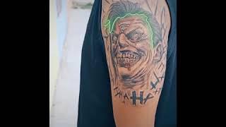 glowing light joker  tattoo by pro tattoo and piercing artist - @illuminatimohit