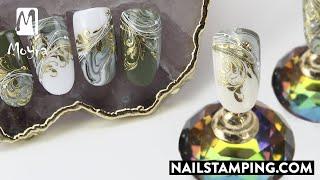 Nail stamping on a marble base with mirror powder (nailstamping.com)