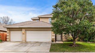 Primary bedroom downstairs in this Natomas home!