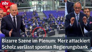 Bizarre Szene im Bundestag: Merz attackiert - Scholz verlässt spontan Regierungsbank  | ntv