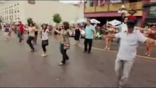 Dancing Zorbas in street -