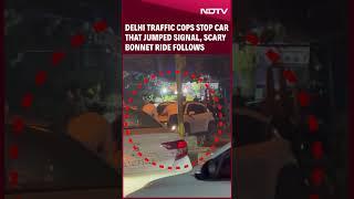 Delhi Police  | Delhi News | Delhi Traffic Cops Stop Car That Jumped Signal, Bonnet Ride Follows