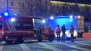 Car ploughs through crowd at German Christmas market