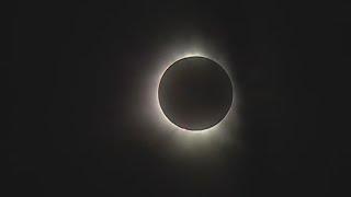 Reaction from Erie as people across the world travel to see full totality