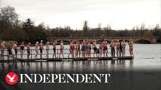 Swimmers compete in Christmas Day race at London's Hyde Park