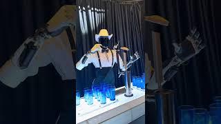 Optimus robot serving drinks at the robotaxi event, October 10, 2024