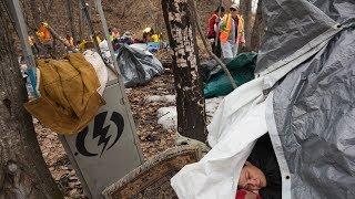 ‘Between a rock and a hard place’: Volunteers clear out longtime Anchorage homeless camp