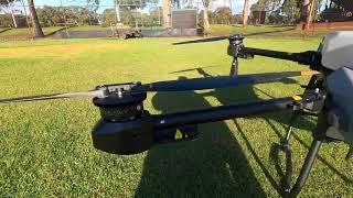 DJI Agras T50 and T25 close up  side by side comparison, including automated spraying.